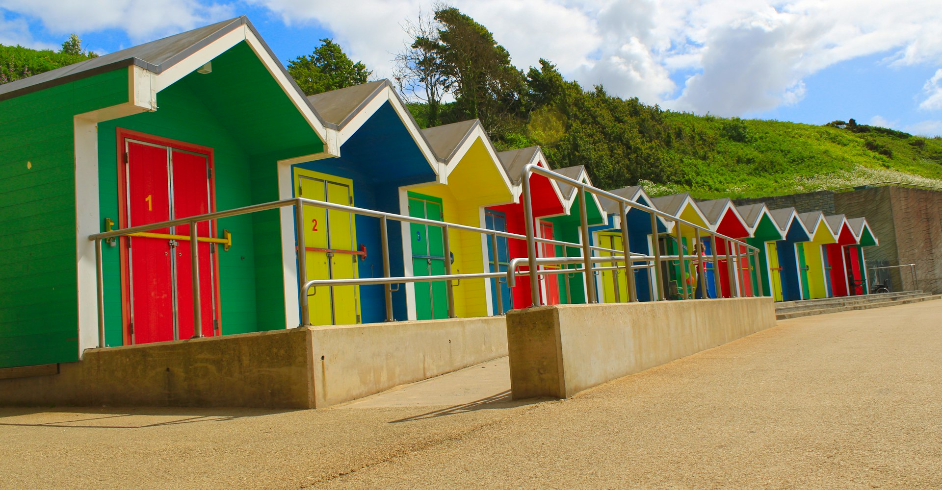 Colourful beach huts on the Barry Island coastline, Vale of Glamorgan